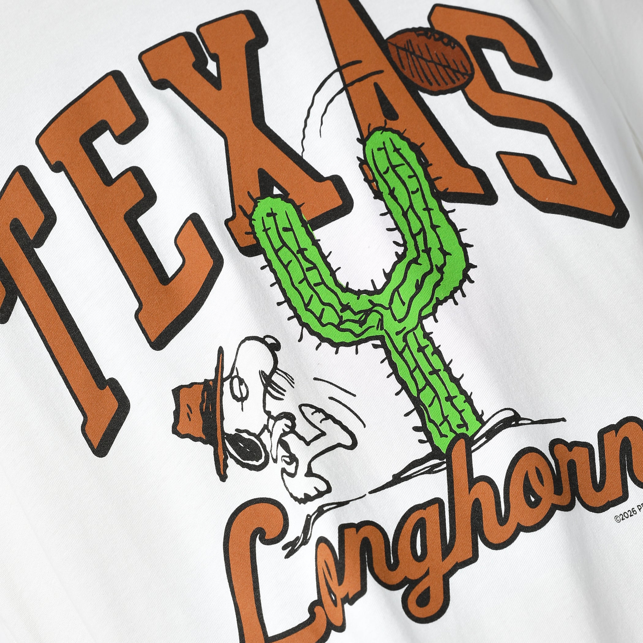 Texas Longhorns Peanuts Spike Football thru Cactus Tee
