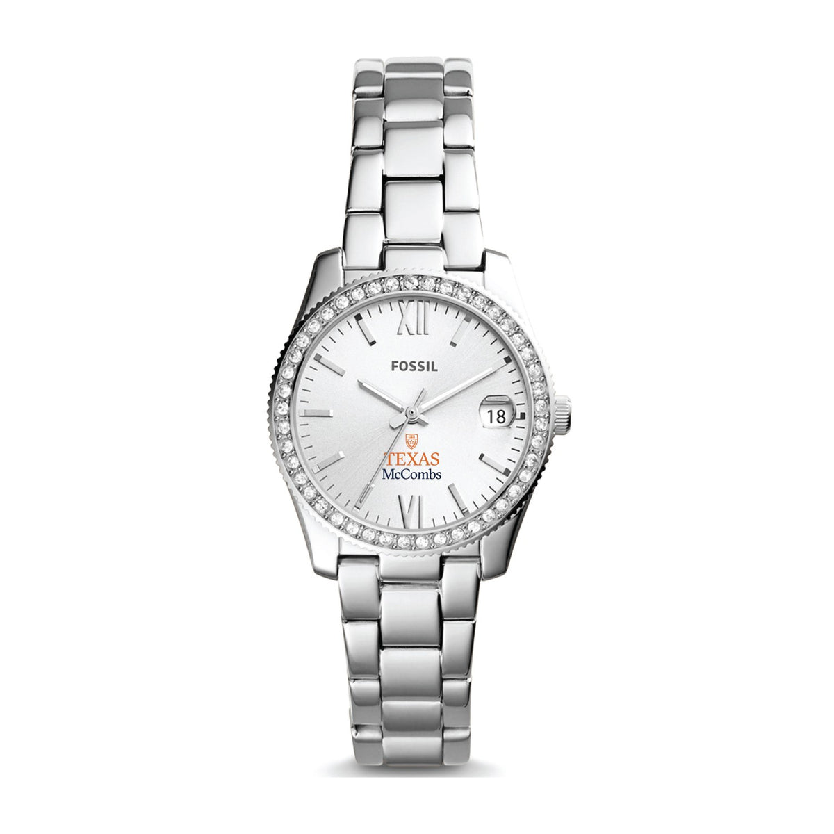 Fossil women's watch with a silver stainless steel link bracelet, a crystal-studded bezel, and a white dial with Roman numerals, a date window, and Fossil Texas McCombs branding.