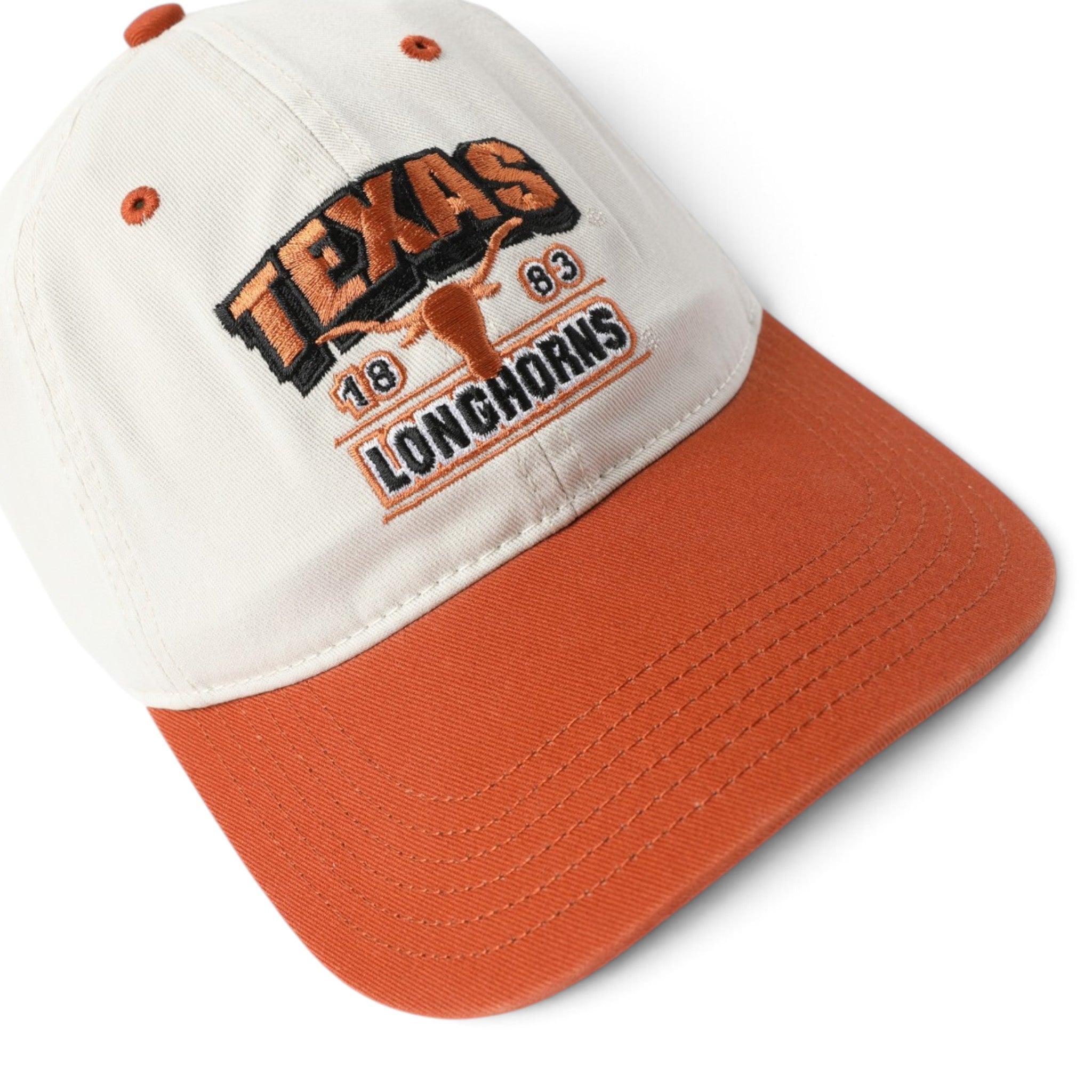 A baseball cap with an off-white crown and an orange curved brim, featuring an embroidered 'Texas Longhorns 1889' logo on the front.