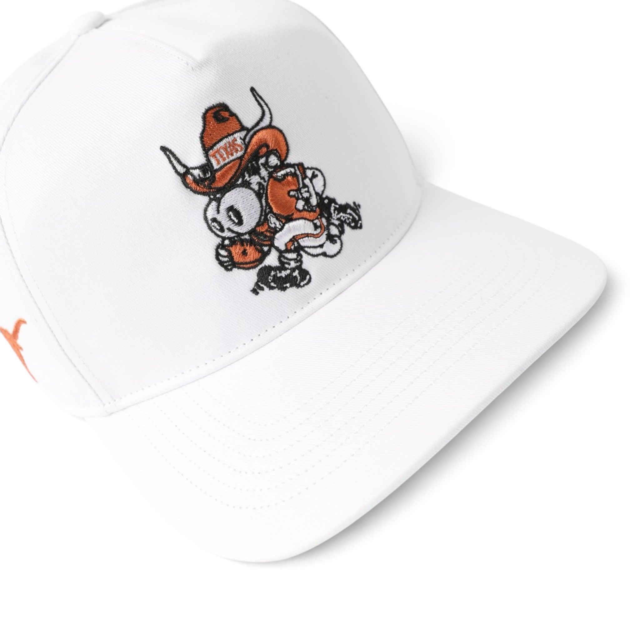 A white structured baseball cap with a cartoon Texas Longhorns graphic on the front, featuring an orange Puma logo on the side, set against a plain white background.