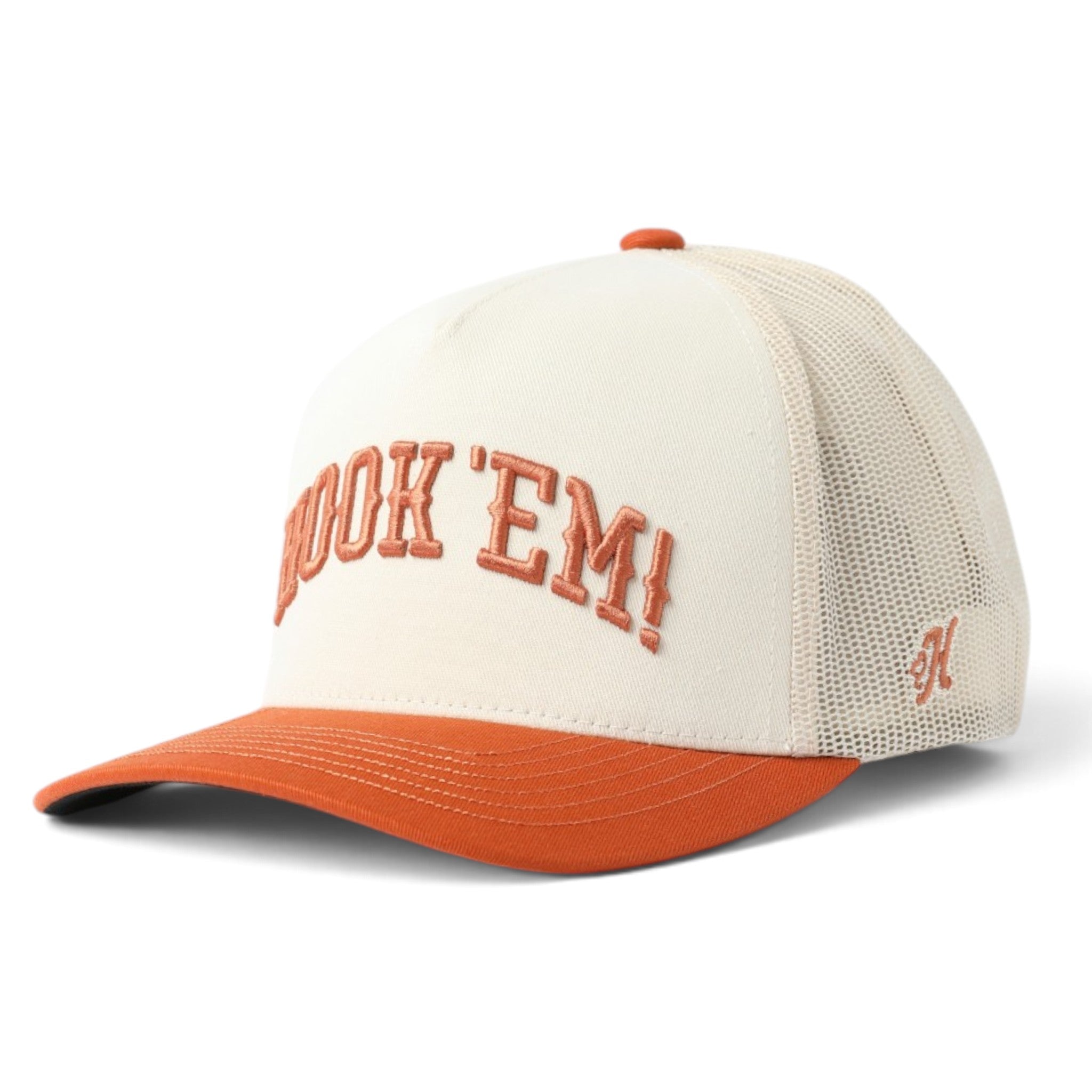 A trucker-style baseball cap with an off-white front panel and brim, orange embroidered text reading 'BOOK 'EM!' on the front, and an orange mesh back. A small embroidered '47' logo is visible on the side mesh.