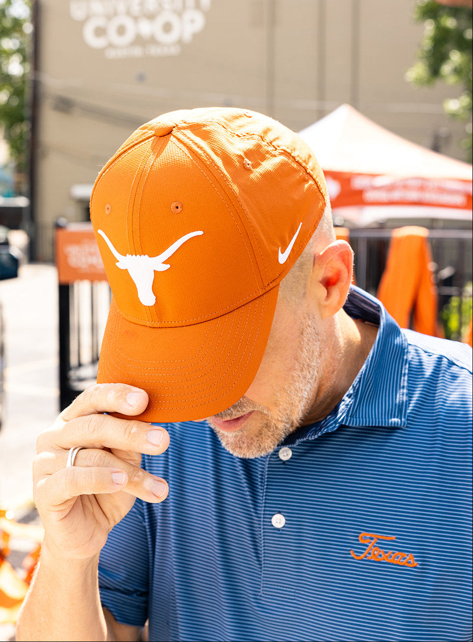 Longhorn UT fan wearing a longhorn cap