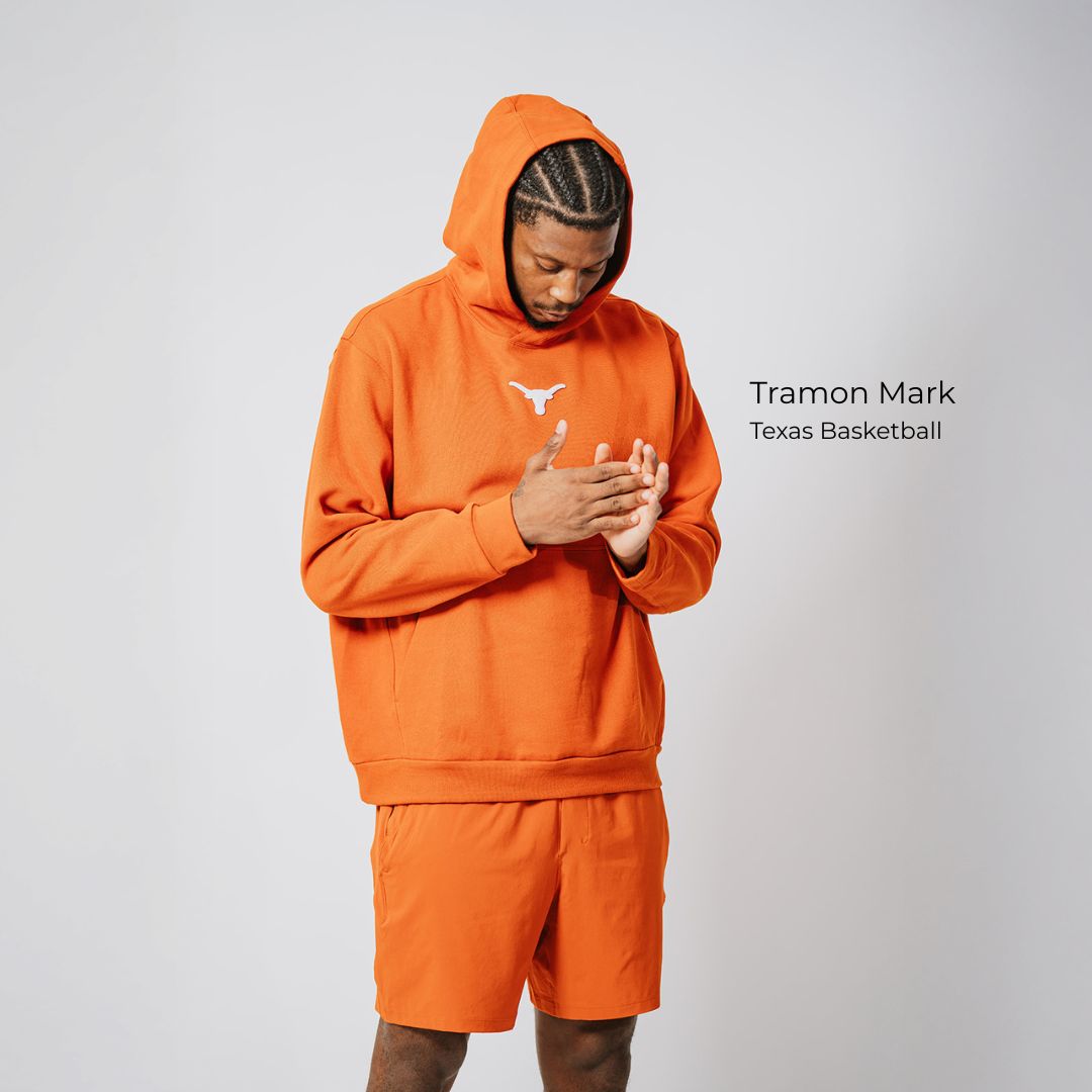 Tramon Mark Texas Basketball athlete wearing burnt orange Longhorn lululemon hoodie